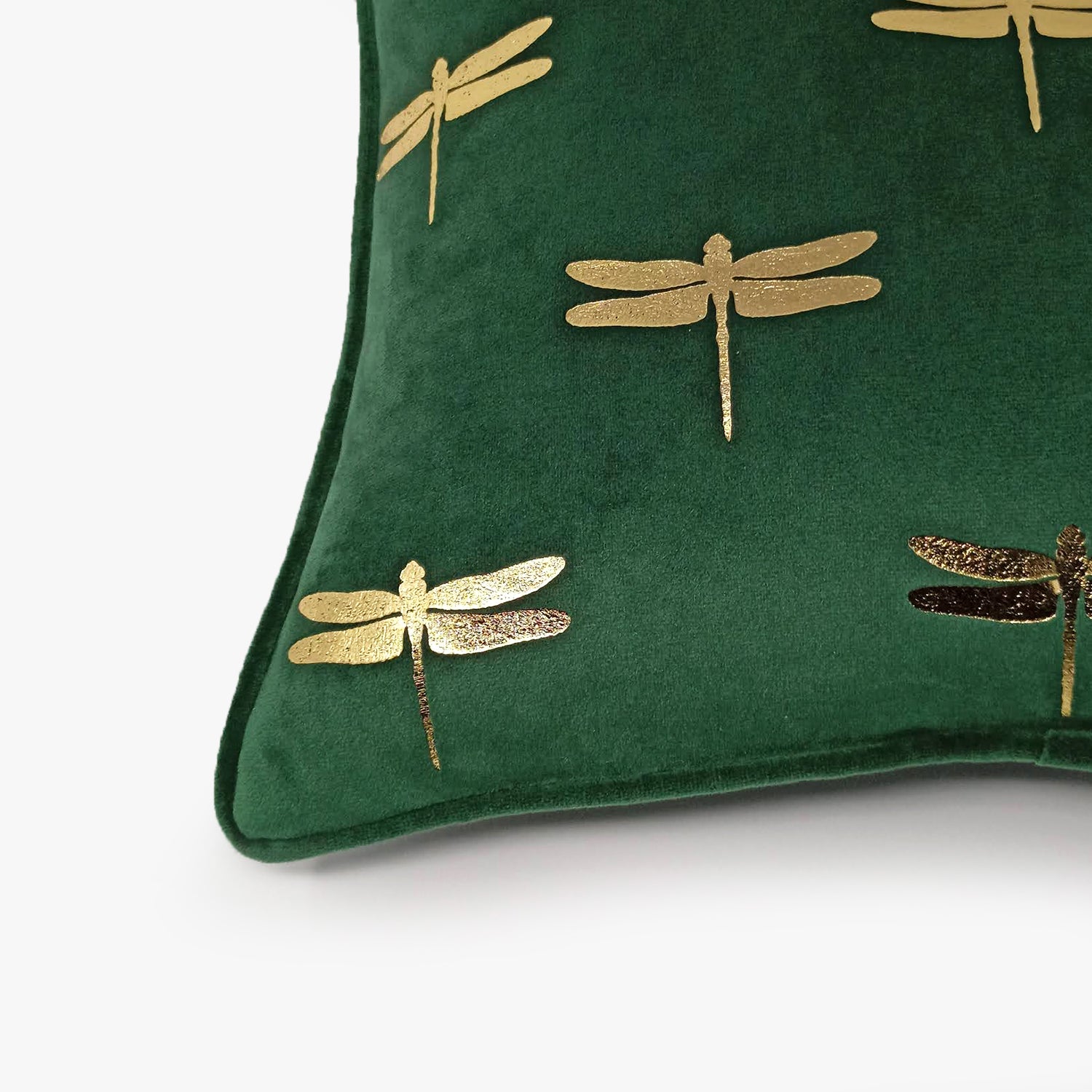Dragonfly foil print velvet cushion cover in dark green, top side view showing piping